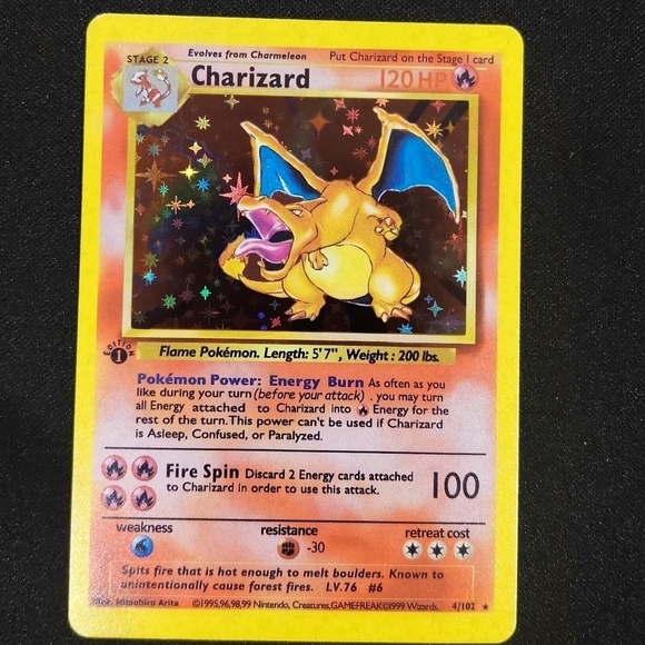 Charizard base set 1st edition 10\10 "REPRINTED"